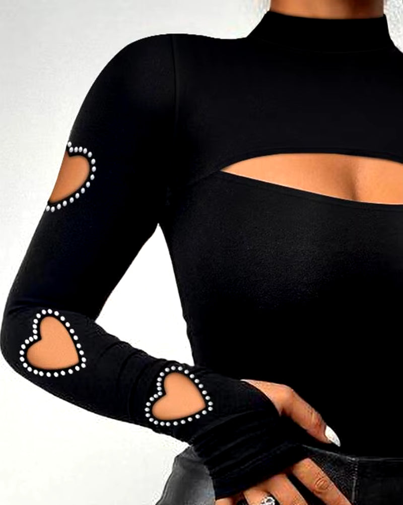 All The Right Places Heart Cutout Top